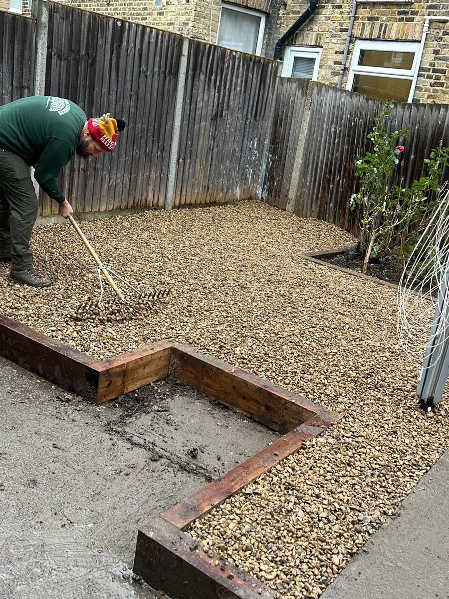 Shingle bed and sleeper edging being laid