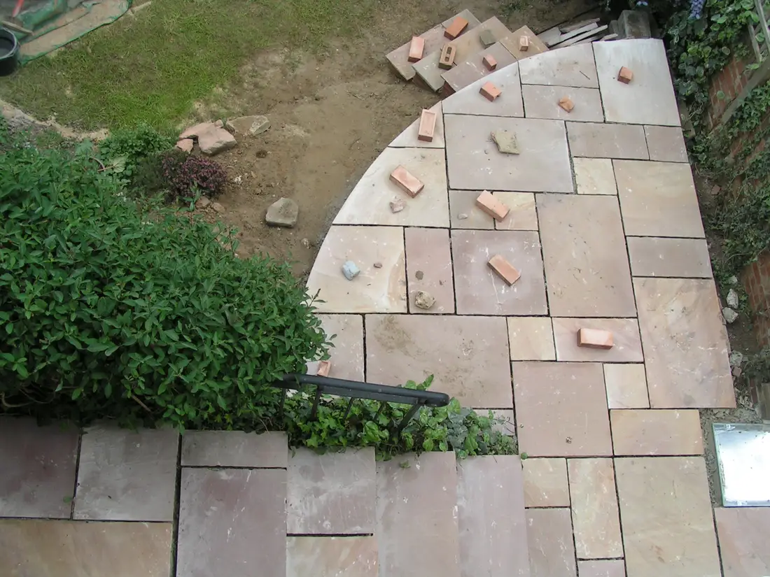 Sandstone patio part laid
