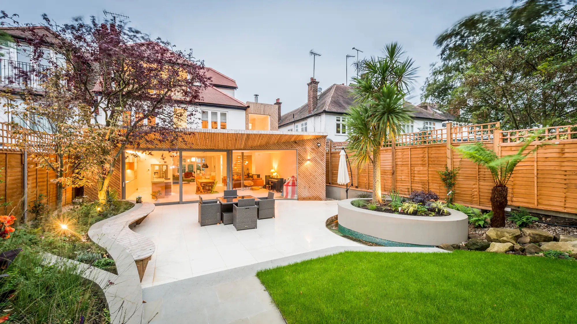 A finished patio and lawn by Merseyside Driveways